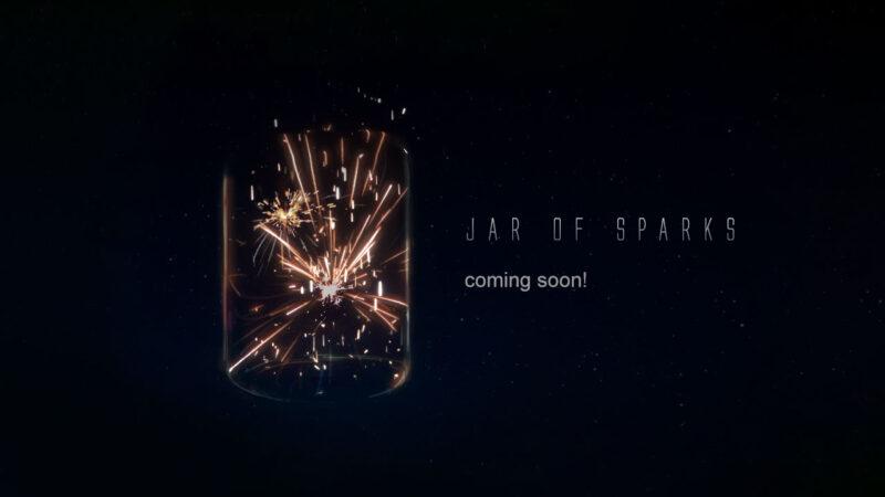 Jar of Sparks logo, an actual jar with sparks on a black background