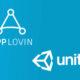 Açık mavi arka planda AppLovin ve Unity logoları