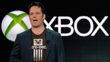 Microsoft Gaming CEO Phil Spencer in front of the Xbox logo