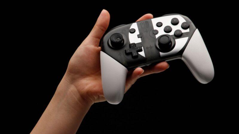 A hand-held Nintendo Switch controller